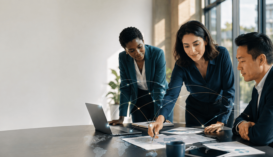Three global mobility professionals review information together as digital connections illustrate coordinated workflows and data.