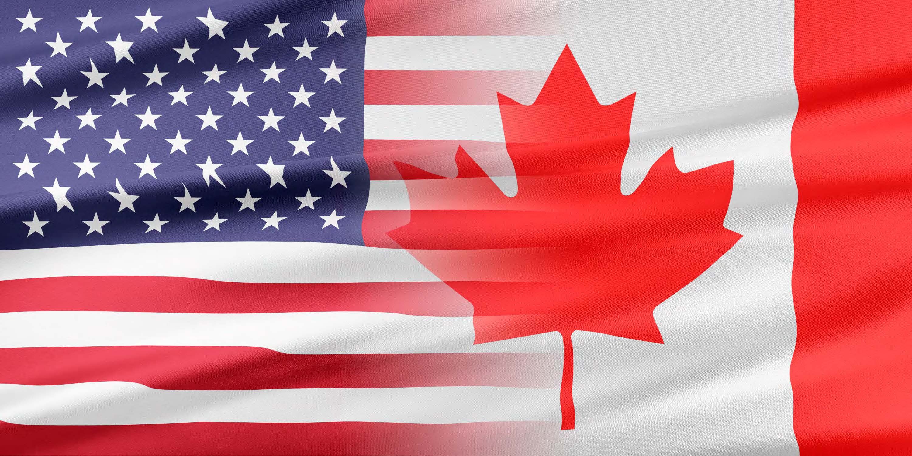 United States and Canadian Flags joining together